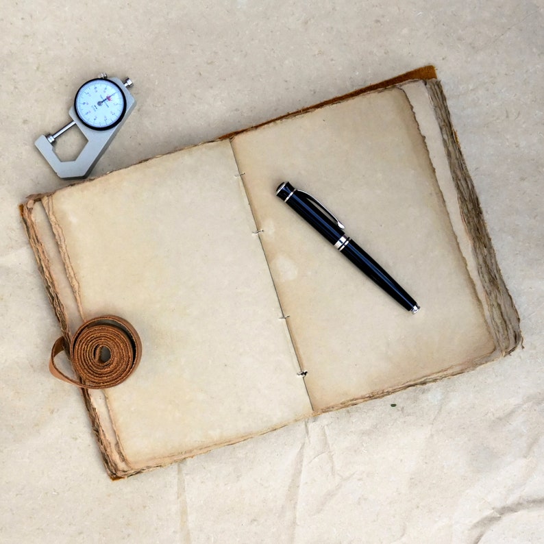 Tree journal with leather strap closed