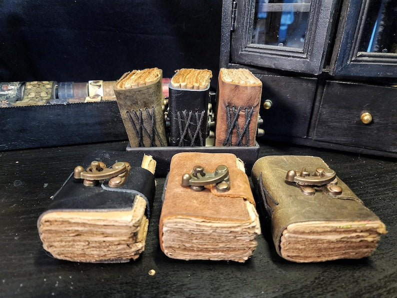Pocket leather journals stacked