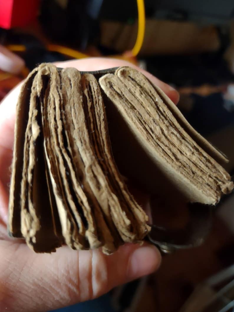 Set of 3 leather journals open pages