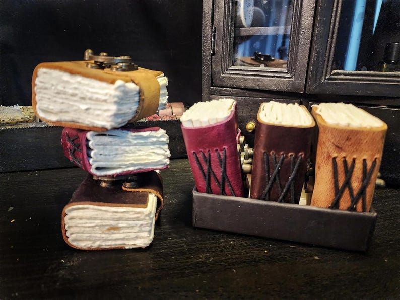 Pocket leather journals stacked dark edition
