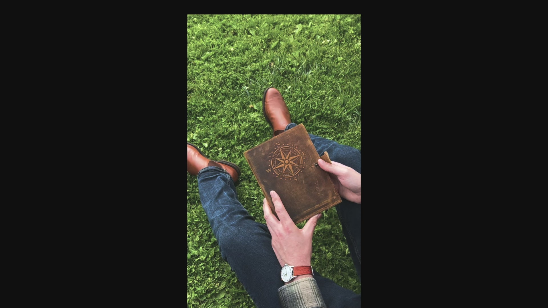 Refillable leather travel journal with embossed compass design cover and lined A5 insert