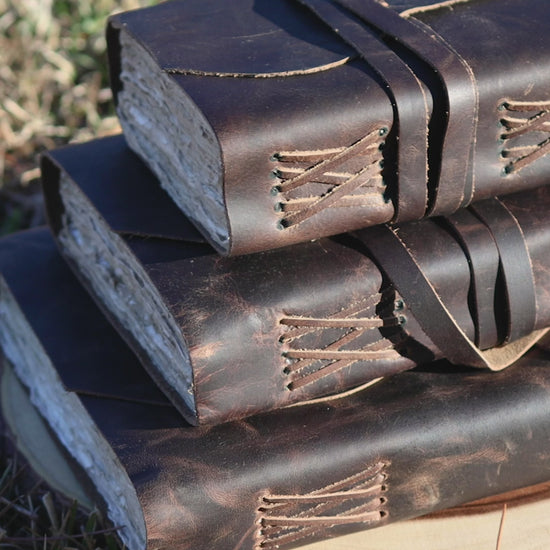 Brown vintage leather journal with blank deckle edge cotton paper pages