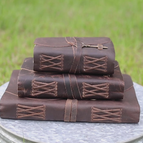 Handmade brown leather journal with deckle edge pages — open and close demonstration
