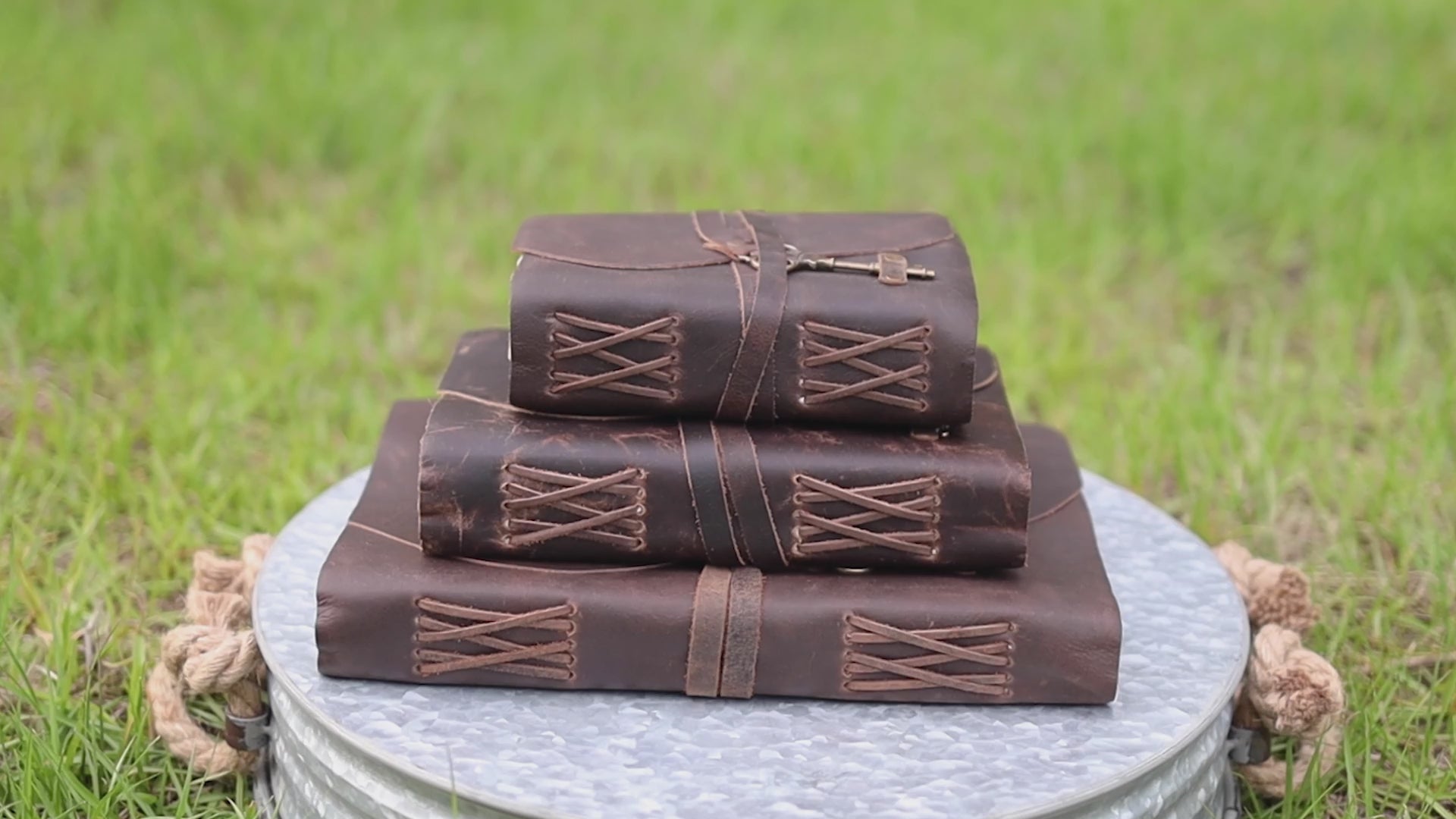 Handmade brown leather journal with deckle edge pages — open and close demonstration