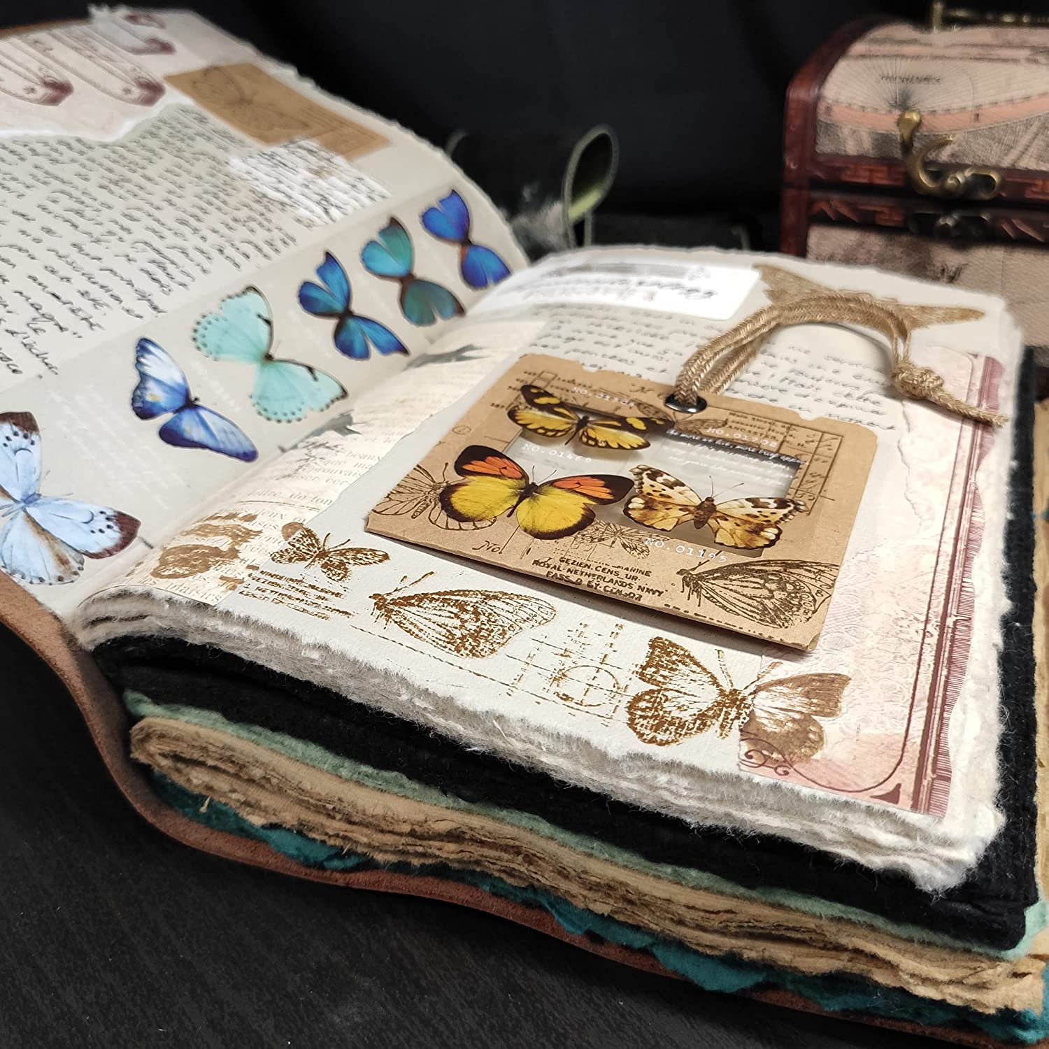Open leather scrapbook journal for art and collage