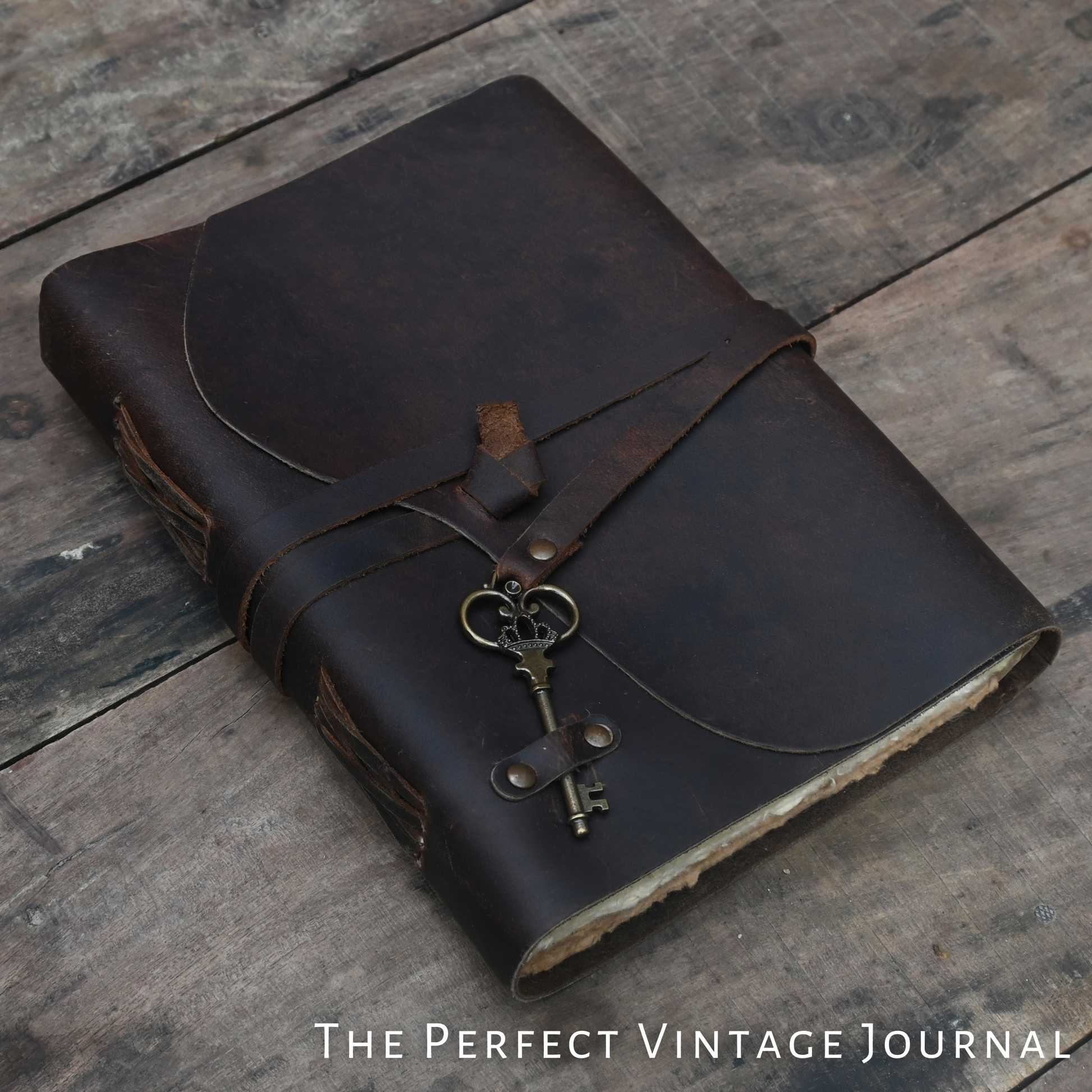 Vintage leather journal with multi-colored handmade pages
