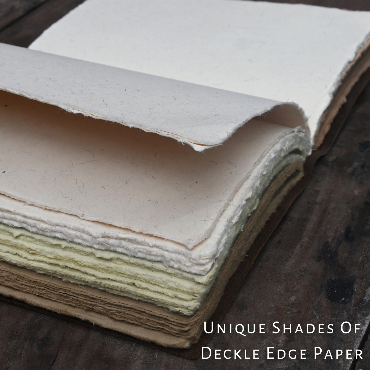 Unique shades of handmade deckle edge paper in leather journal