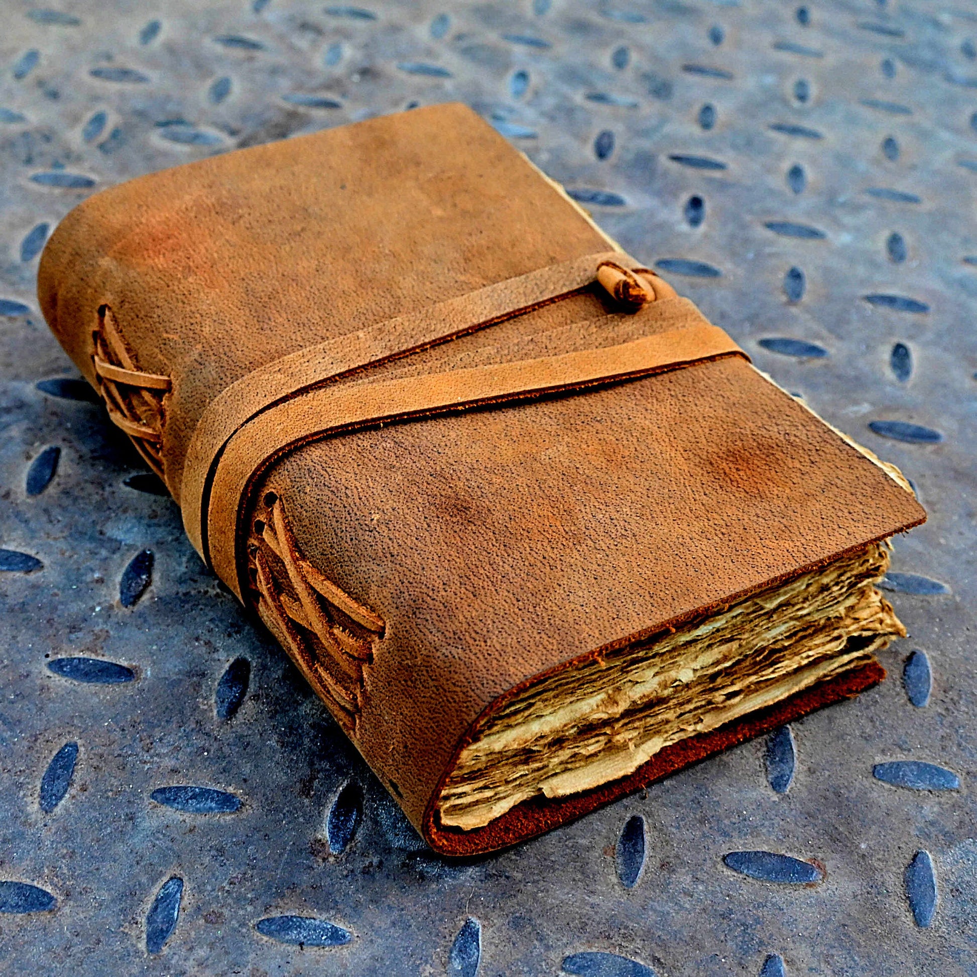 Tan vintage leather journal front cover